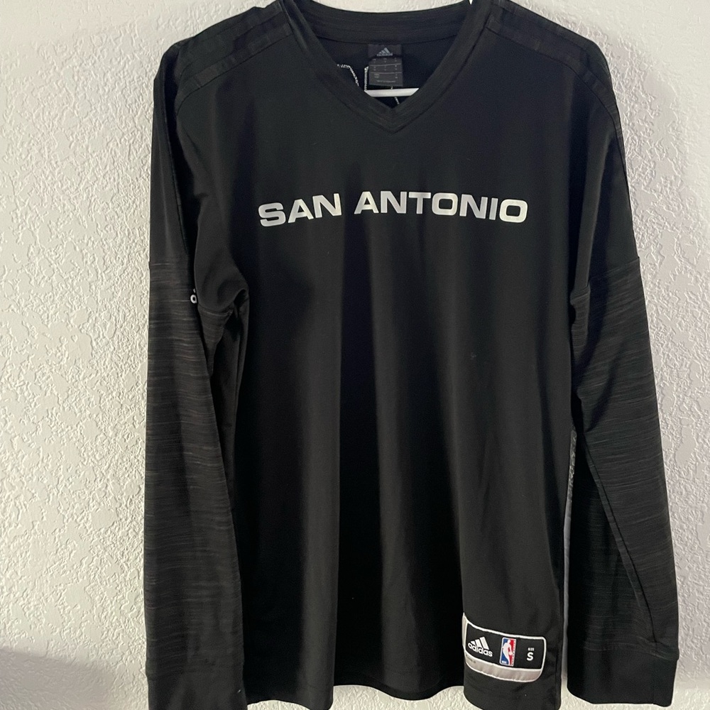 Small San Antonio Spurs shooting shirt. It too small for me, never really worn.